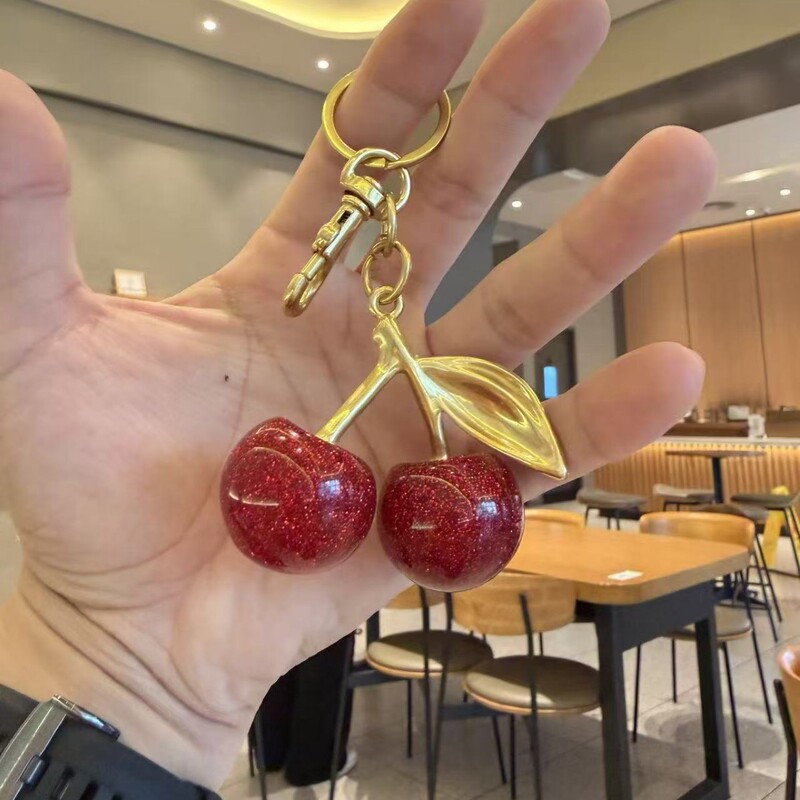 Cherry-themed bag charms, creative cherry pendants, cherry fruit accessories, cross-border C-brand keychains and ornaments Cherry-themed bag charms, creative cherry pendants, cherry fruit accessories, cross-border C-brand keychains and ornaments