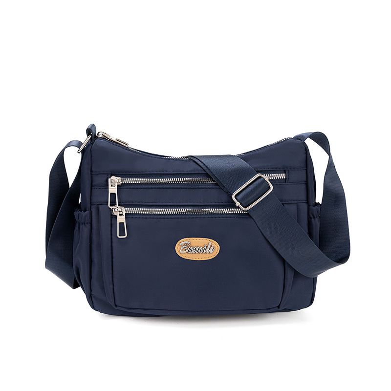 Bolso explosivo, tela de nailon para mujer, bolso de mensajero casual de gran capacidad, bolso de hombro ligero simple para madre de mediana edad para mujer