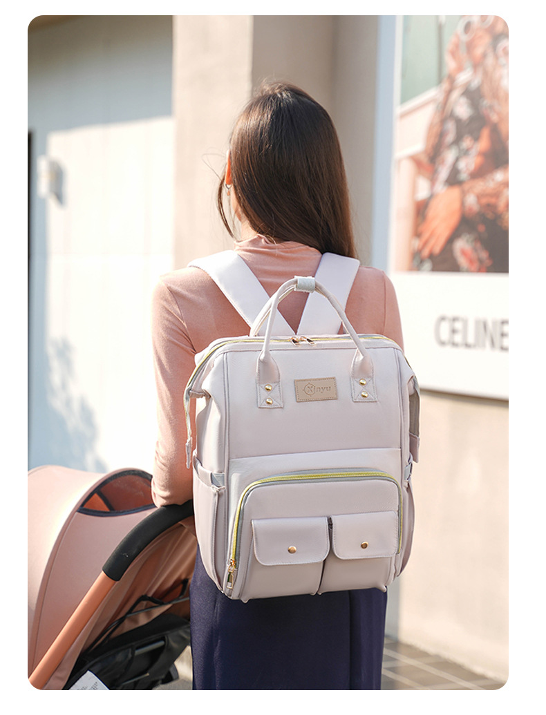 The 2025 new product is a high-end outdoor milk storage, heat preservation, large-capacity baby bag, multi-functional storage, and cross-border mommy bag undefined