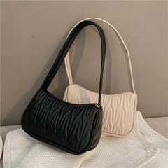 新しいトレンディなショルダー脇の下バッグ、ハイエンドのファッションソリッドカラーバッグ、レディースバッグ、ニッチデザインのポータブル小さな正方形バッグ