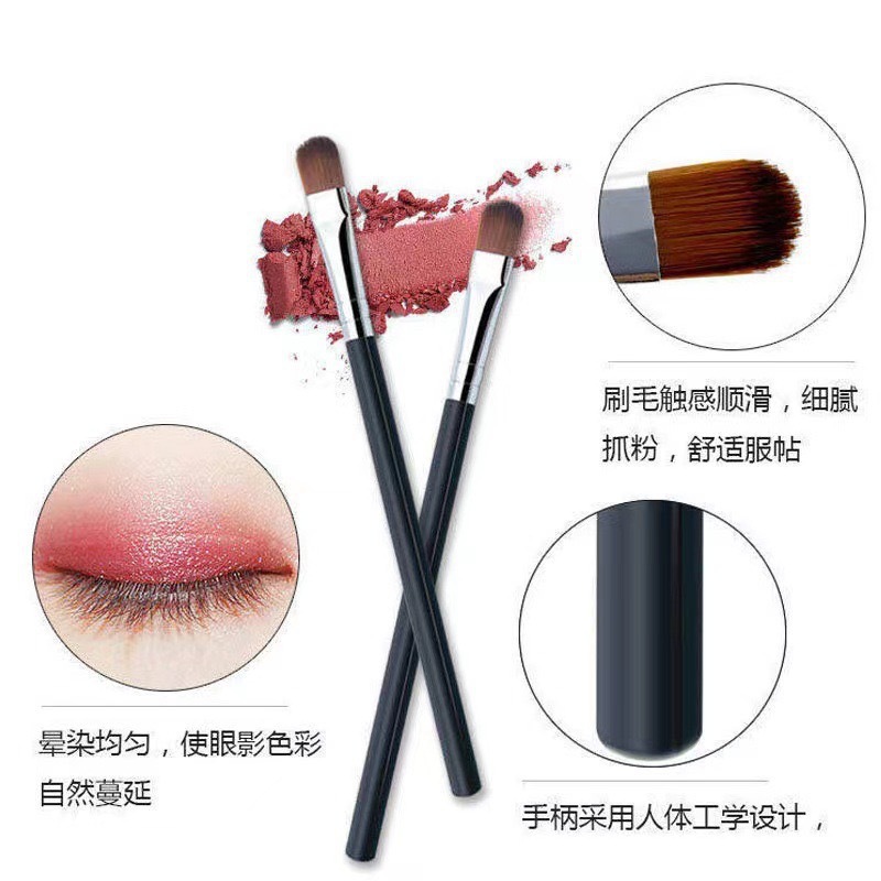 Small handheld brush