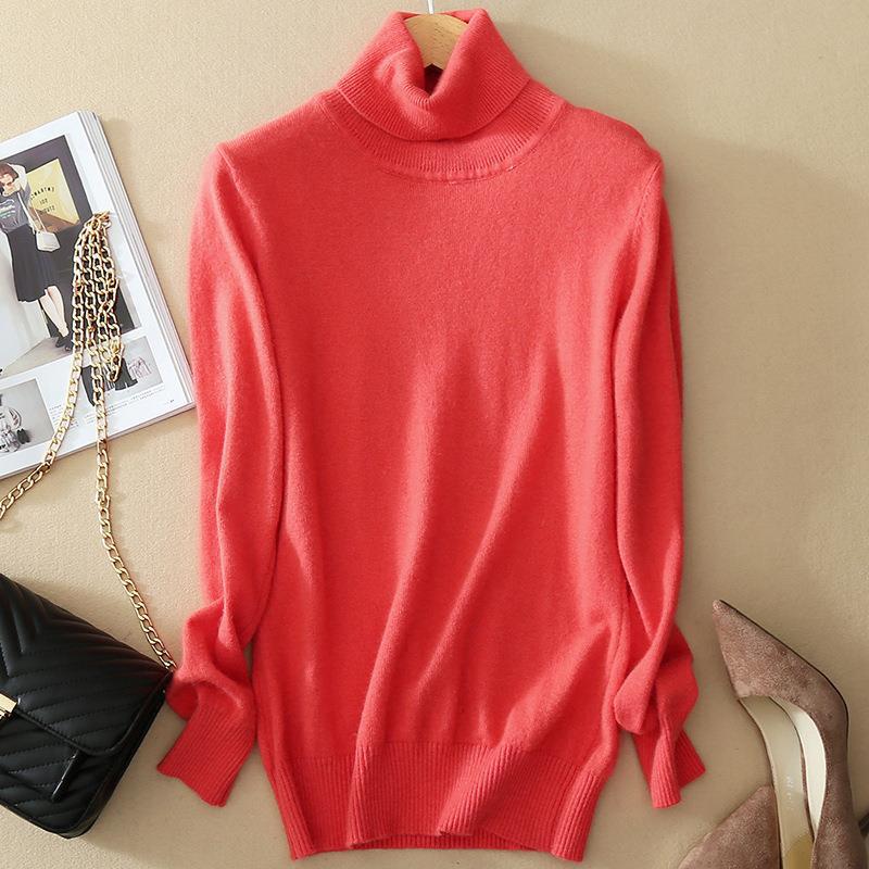セーターの高襟のセーターの秋冬のプルオーバーの長袖の純色のゆったりしている底のニットの女性の韓国版