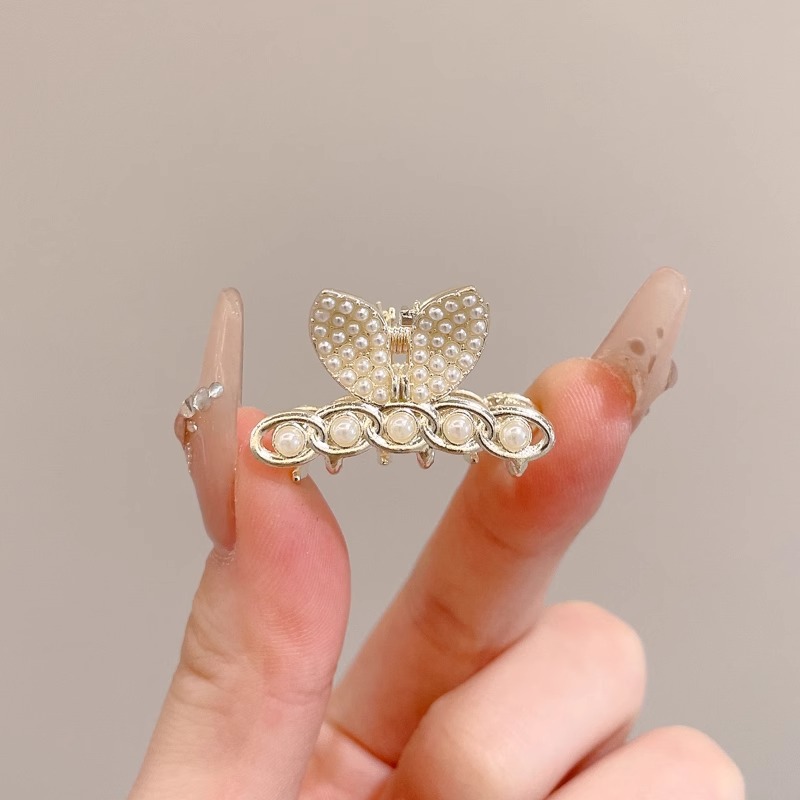 Perla de alta sensación de diamante de agarre para mujeres 2025, nuevo tipo de cabeza trasera, abrazadera de cabello, tocado, abrazadera de cabello pequeña