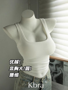 Comics, thin tank top, fitted underwear as outerwear, base top with cups