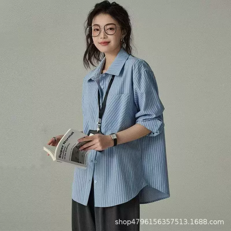 新款蓝色条纹衬衫女春气质职业通勤早春叠穿长袖宽松百搭休闲衬衣