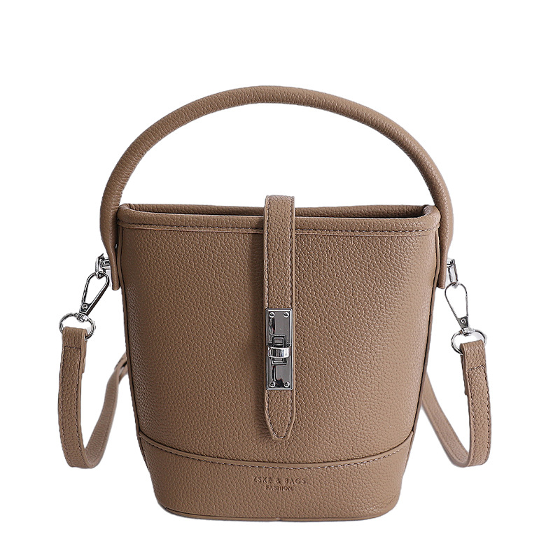 Litchi estampado bolso de cubo de mano mujer 2026 venta caliente nueva moda coreana alta textura mochila de hombro