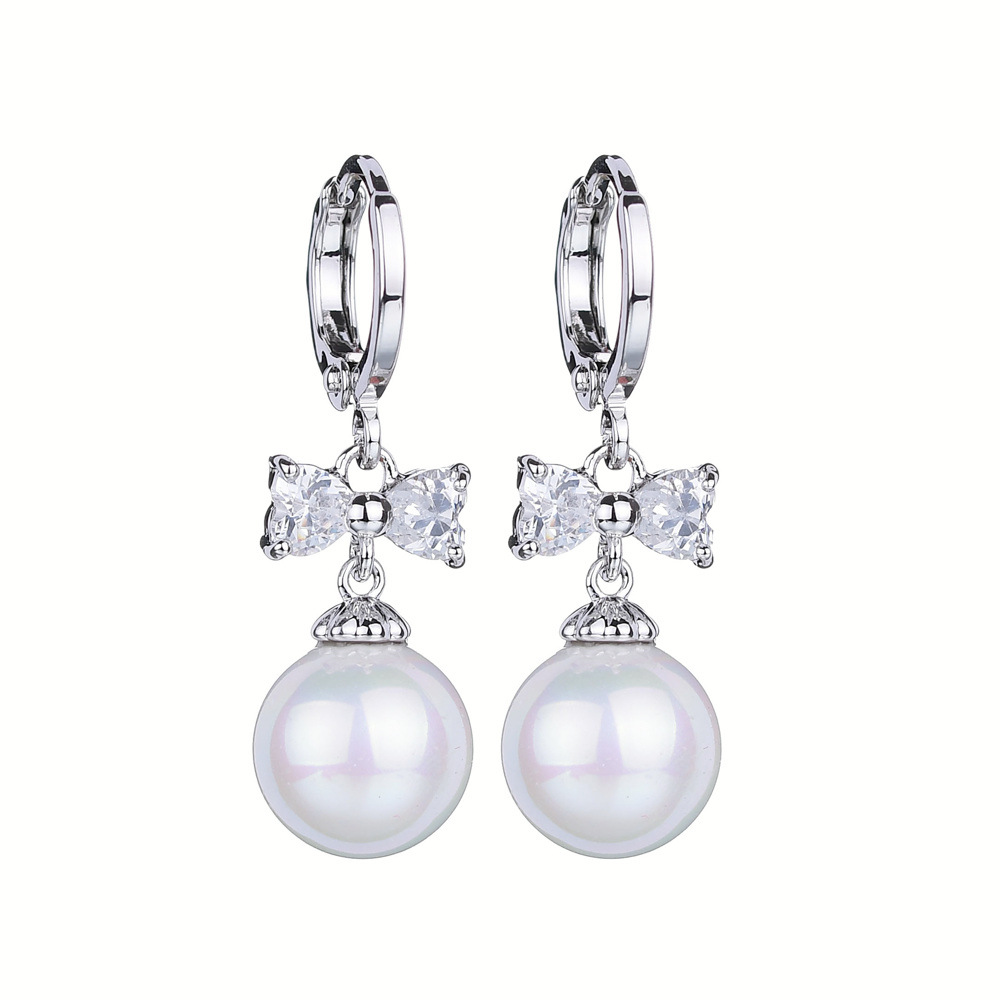 Genuine fashionable long earrings with bow with zircon with tassels…