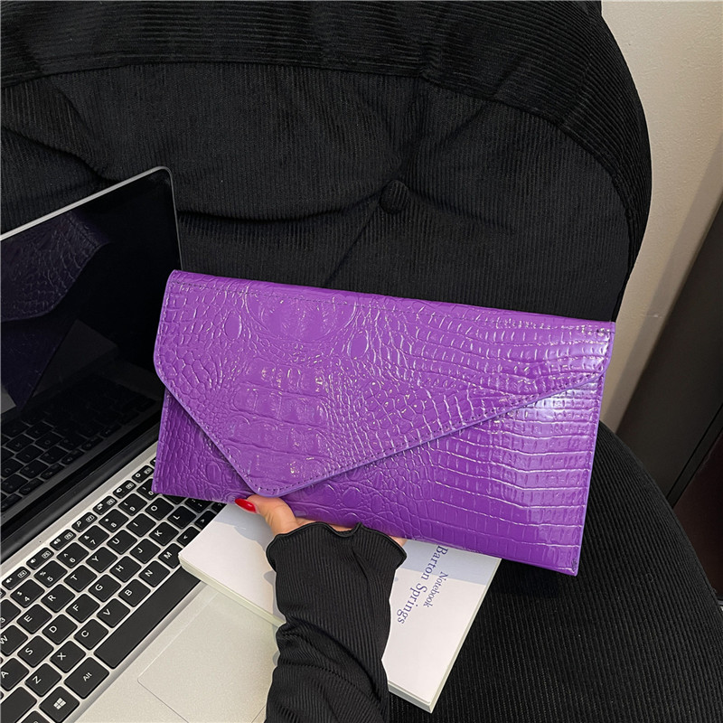Este año, la popularidad de las mujeres europeas y estadounidenses retro cocodrilo piel impresión bolso de mano larga alta sensación casual multifuncional cartera de cena