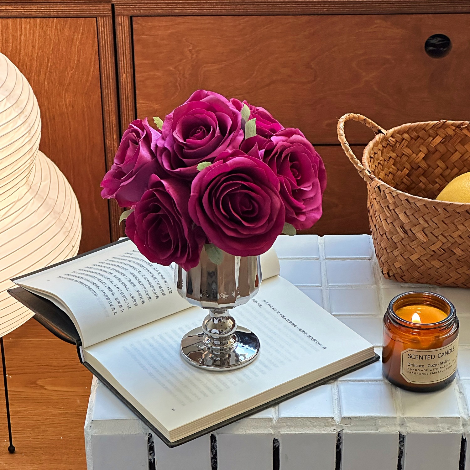 Pleated bottle + hand holding purple-red mist]