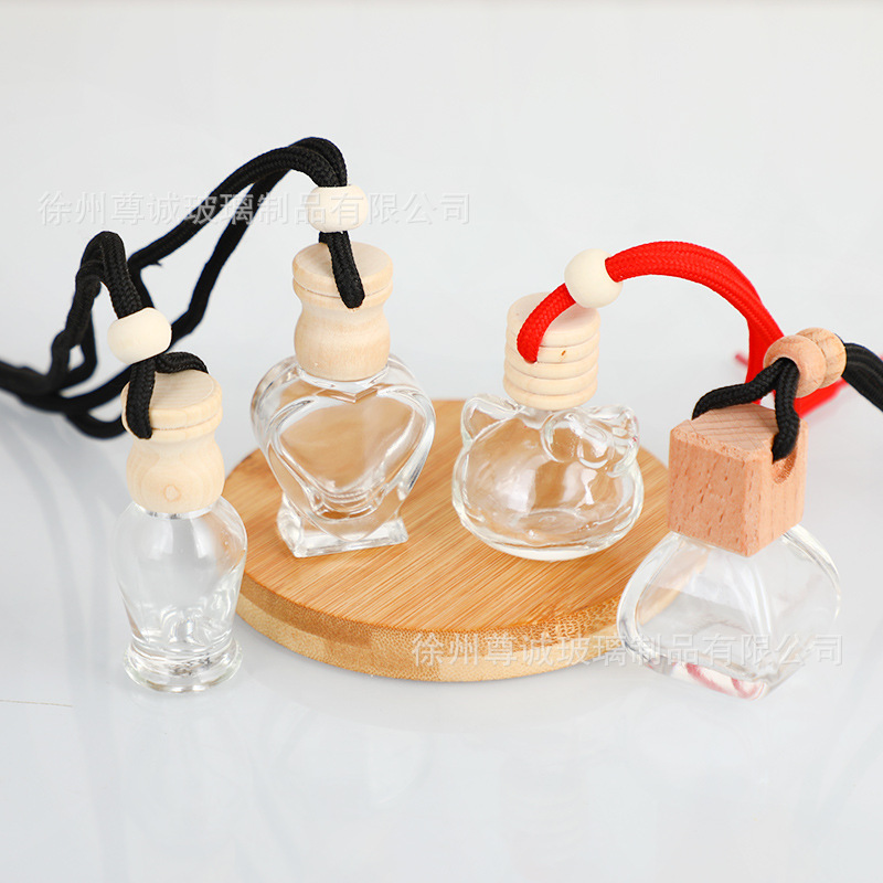 Botella de perfume de cables de automóvil botella vacía botella de perfume de automóvil colgante tapa de madera botella vacía perfumes volátiles al por mayor