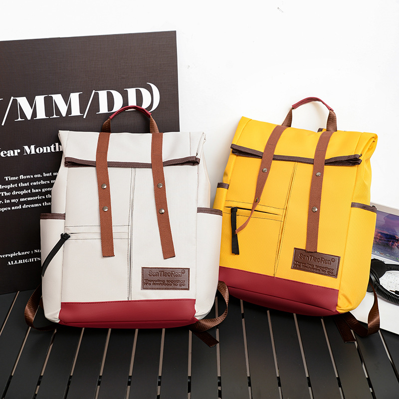 Water repellent capacious travel bag