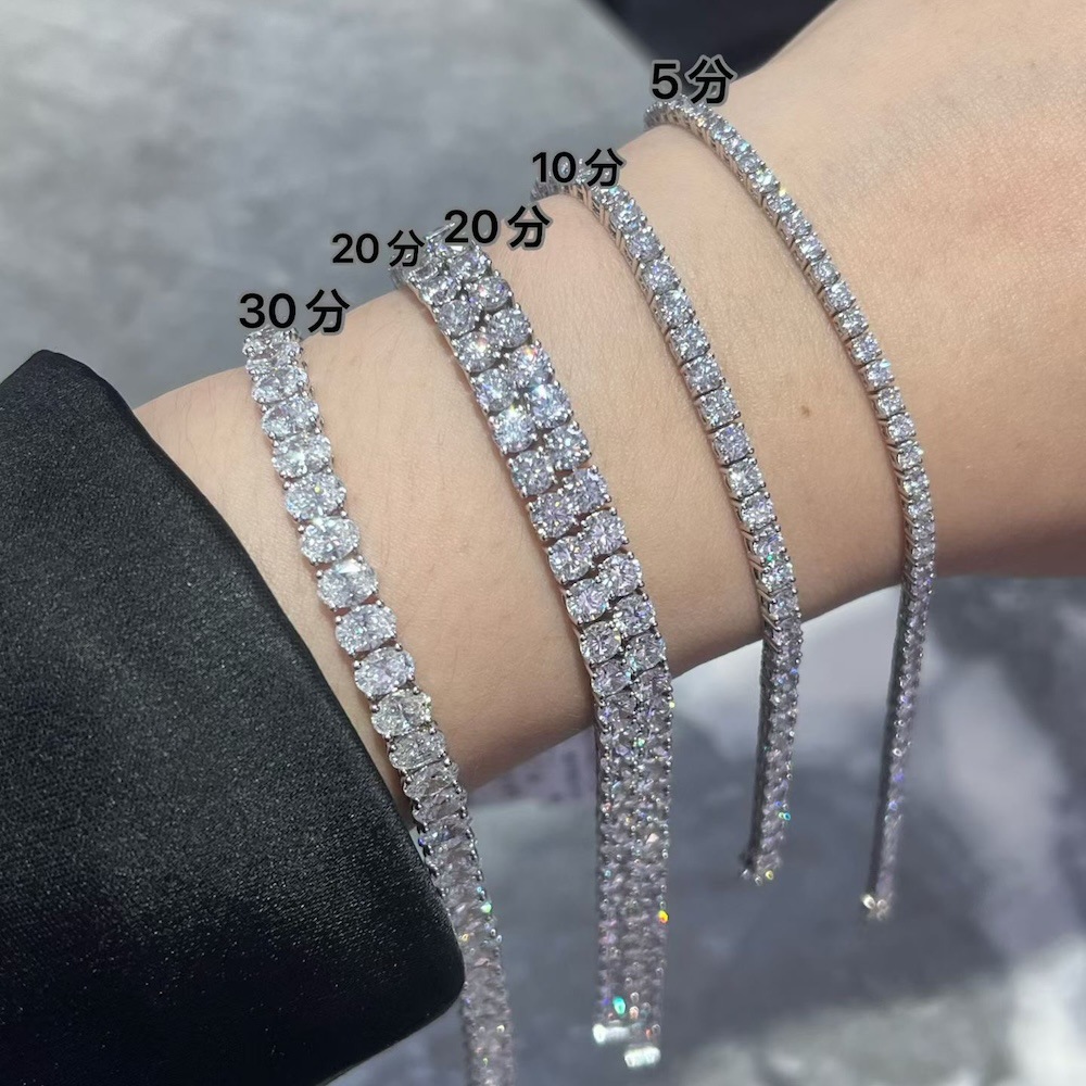 Gold, platinum, and water-shell precision-crafted tennis bracelet, sourced from IGI lab-grown diamond wholesale factory, unisex custom design.