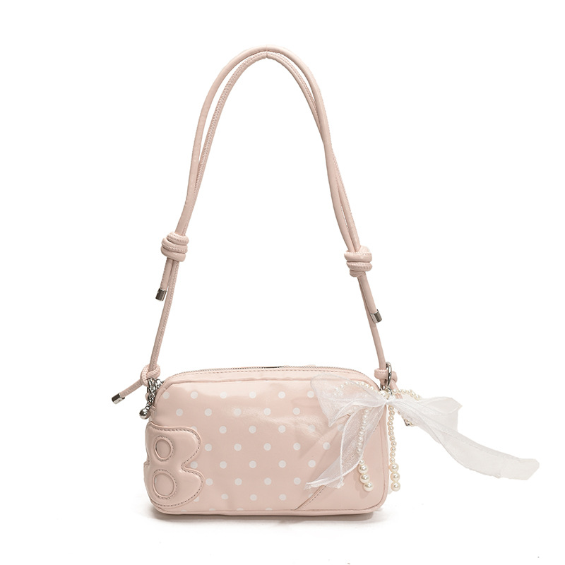 Bolso de moda coreano 2025 verano nuevo bolso femenino bolso de hombro de punto de onda de estilo extranjero celebridad de Internet bolso de mensajero del mismo estilo marea