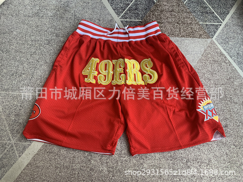 Comercio exterior pantalones de fútbol al por mayor Warriors Lakers 76 caliente Raptor mágico bolsillo bordado pantalones cortos pantalones de baloncesto NFL