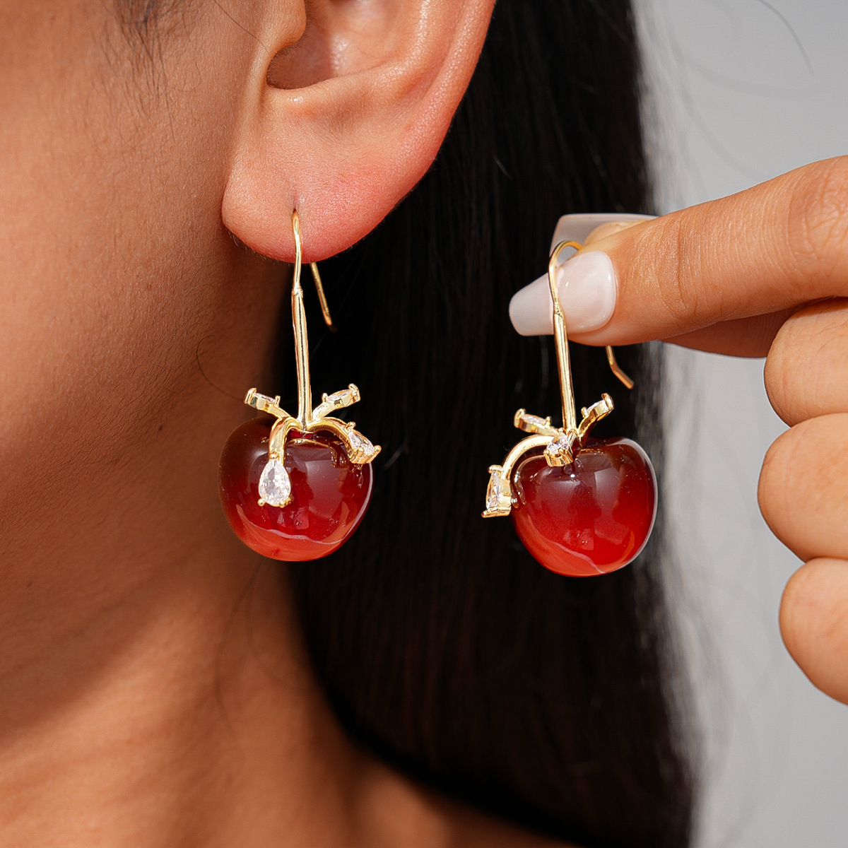 Europa y América resina zircon arco manzana gancho de auriculares de Año Nuevo feliz dulce aretes de moda nicho alta sensación de auriculares