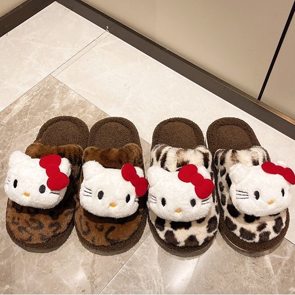 Hello Kitty zapatillas estampadas de leopardo interior de peluche de peluche de invierno anti-deslizante calentamiento al por mayor zapatillas de algodón lindas