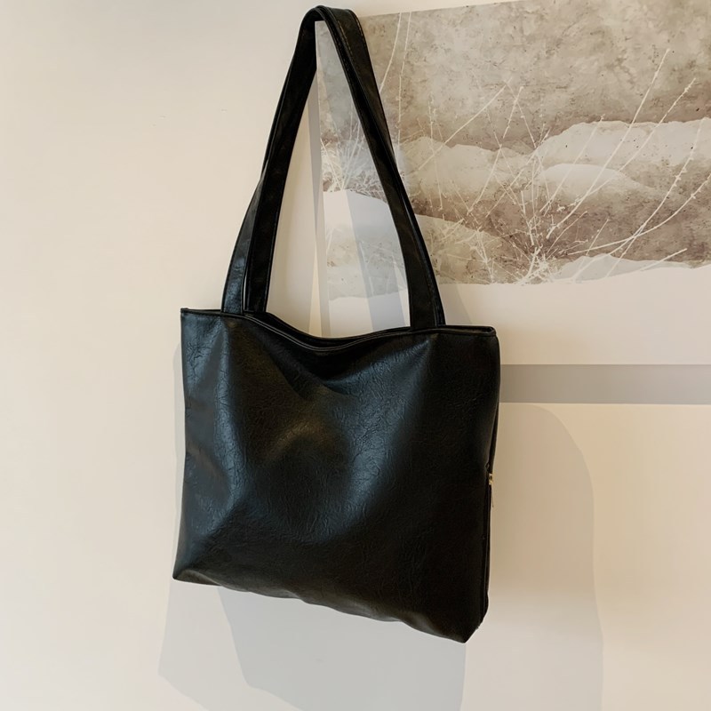 Bagos de vestir vintage de estilo perezoso para mujeres 2024 otoño nuevo paquete de hombro bajo la axila de la pequeña capacidad de la bolsa de hombro de viaje