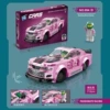 Big fuchsia racing car, doll, 218 pieces