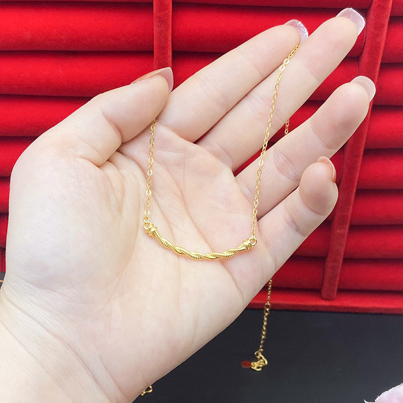 2024 nuevo collar de giro de oro estilo simple todo a juego popular luz lujo nicho diseño niña pequeño libro rojo todo a juego