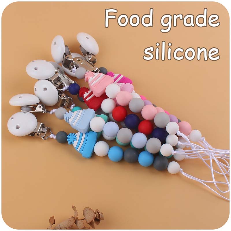 Nuevo bebé suministros chupete cadena bebé creativo de dibujos animados sombrero de Navidad silicona mordida pegamento anti-gota cadena