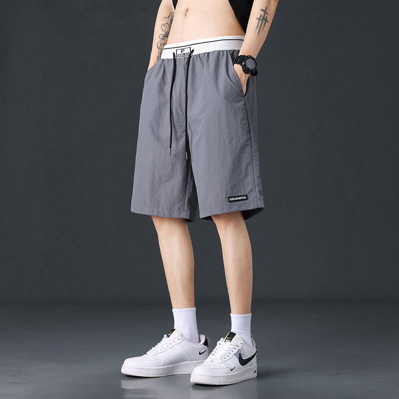 Pantalones cortos de hielo para hombres de verano negro delgado deportivo de hombre de verano rápido secado pantalones de baloncesto de playa de cinco puntos