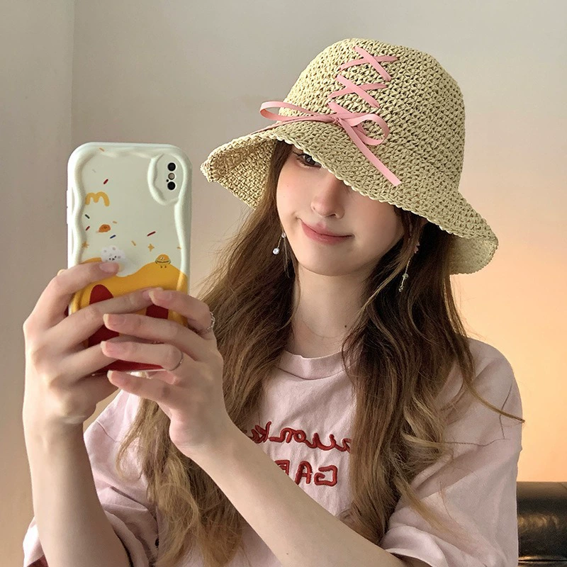 Корейская версия соломенной шляпы с бантом вязаный волнистый большой край пляжная шляпа женская наружная игра солнцезащитный солнцезащитный шапка оптом