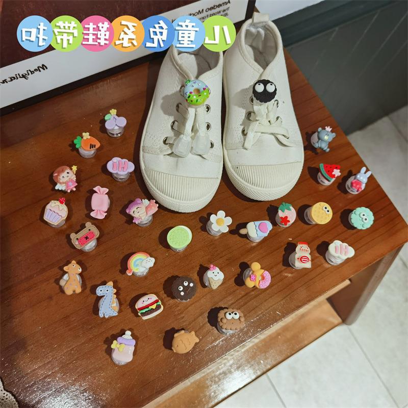 Nuevos niños de dibujos animados perezosos sin cordones cuerda hebilla fija kindergarten niños y niñas zapatilla Accesorios