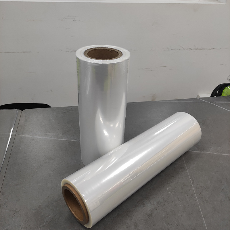 Fábrica al por mayor POF película retráctil película criogénica transparente reticulada película plegable cosmética embalaje Termocontraíble película de sellado de plástico