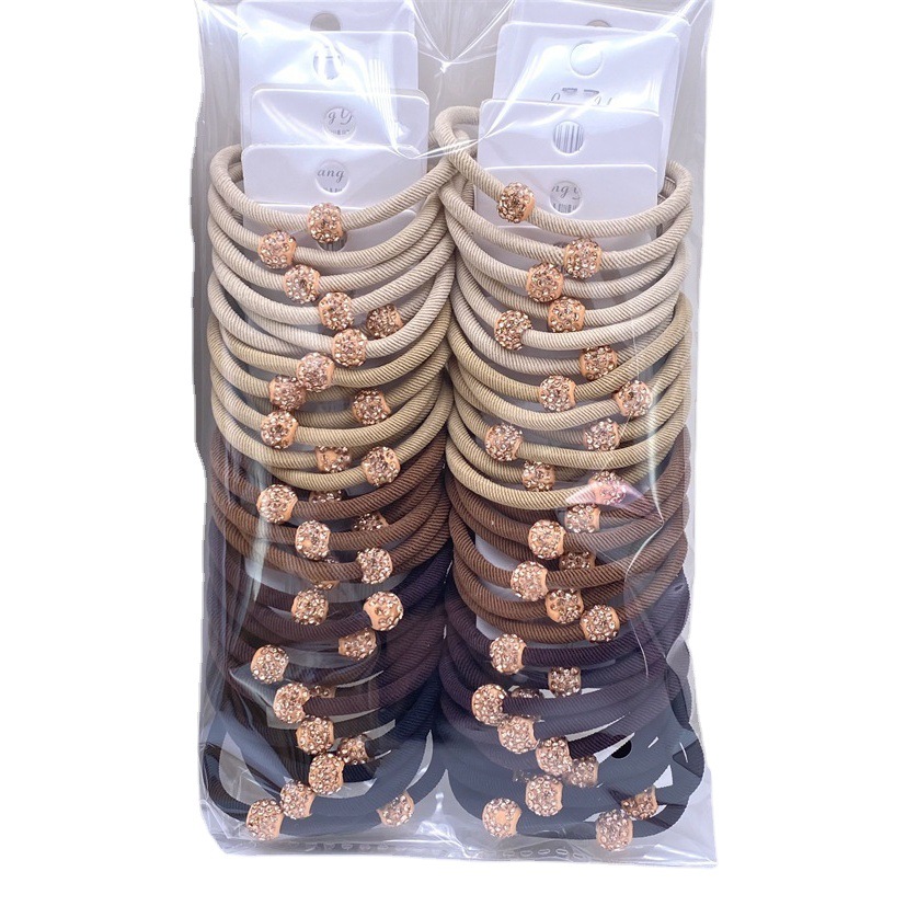 Montado en la tarjeta de leche de té de color Diamante de nivel A línea de banda de pelo pajarita de las mujeres corbata de pelo bola banda de goma tienda física 2 yuanes tienda de joyería