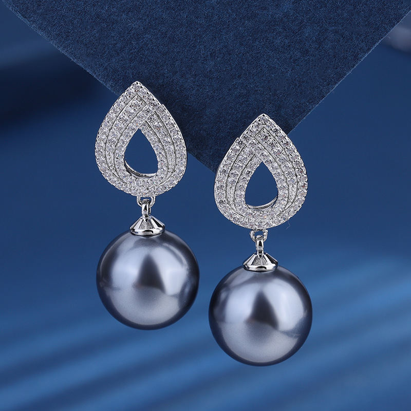 Zhuang Sheng joyería de cobre inferior chapado en oro con incrustaciones de perlas de moda coreana gris perla traje 14mm al por mayor