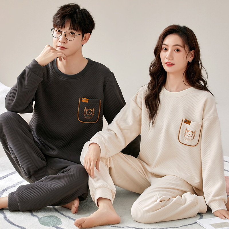 El otoño y el invierno sándwich de manga larga pareja pijamas engrosada de dibujos animados cuello redondo jersey de los hombres y las mujeres de ropa de casa caliente se puede usar fuera