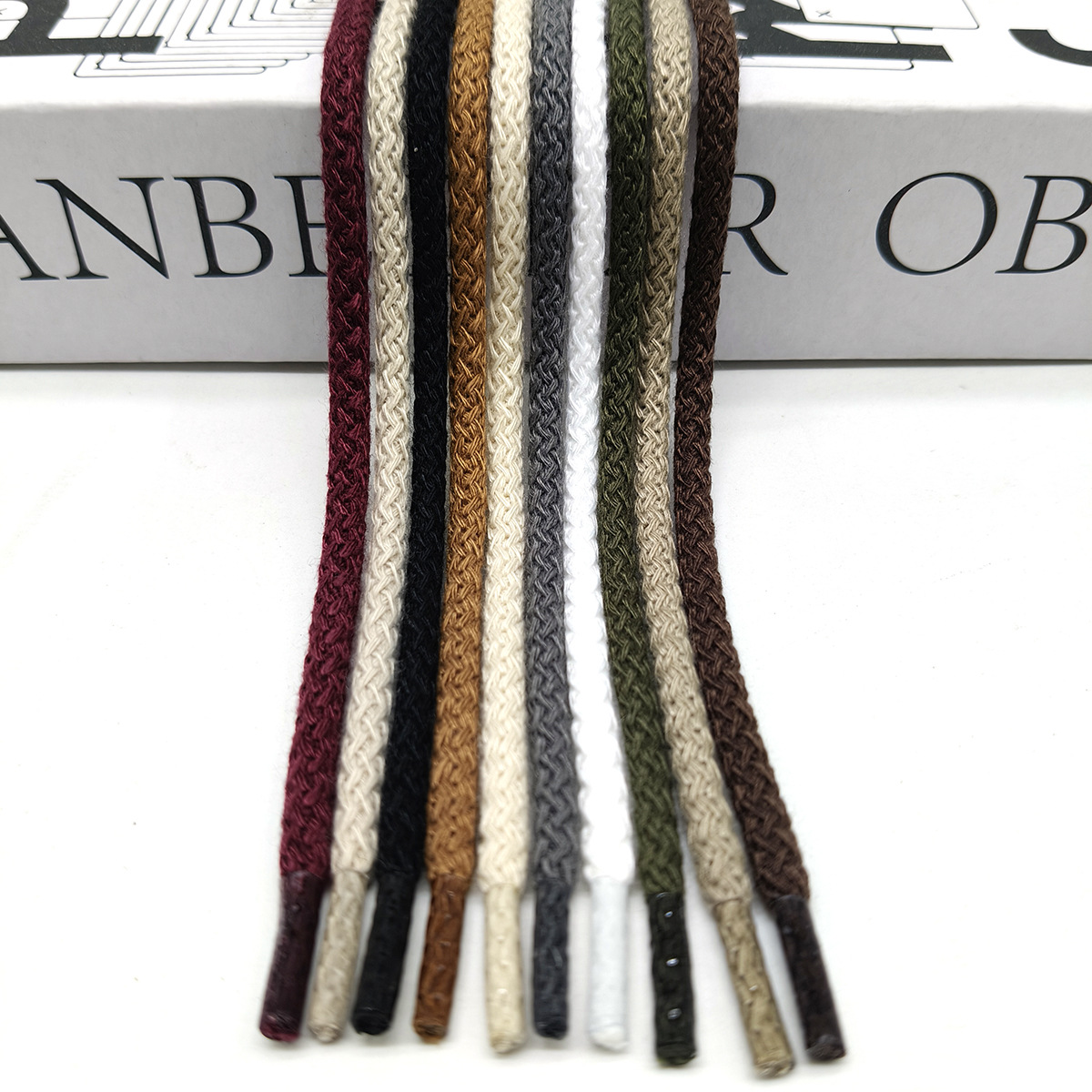 490 colores opcionales 5mm poliéster algodón teñido de alta temperatura sólido fantasía trenzado cuerda redonda cuerda de pulsación de cintura de color neto cuerda de chaqueta
