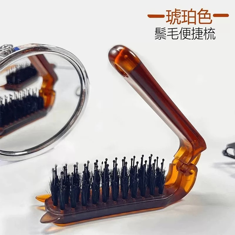 Portable folding bristle comb