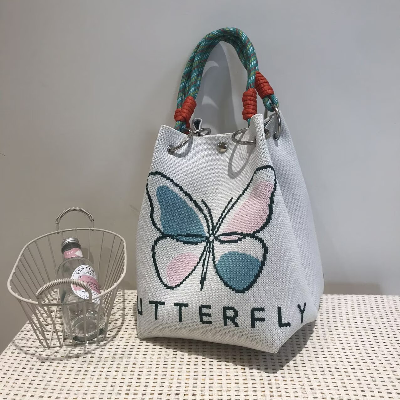Nueva edición de la pequeña bolsa de mano de nudo de corda de viento de primavera y otoño elegante para viajar bolsa de mano de gran capacidad