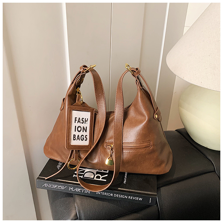 Bolsas retro de gran capacidad para mujeres 2026 nuevo estilo coreano de ocio de hombro con bolsas de brazalete inclinadas para viajar bolsas de mano simples