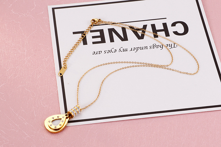 new European and American creative titanium steel drop stick diamond necklace earrings suit wholesal