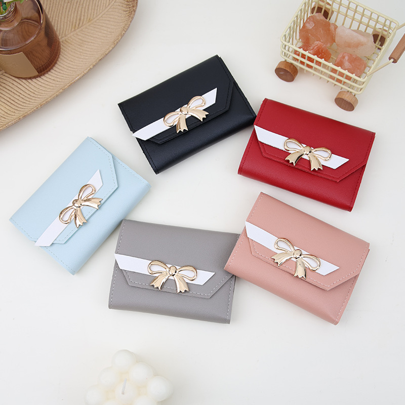 Cross-border bestseller 2026 new model cute short bow 70% off women's wallet mini coin purse PU small card holder