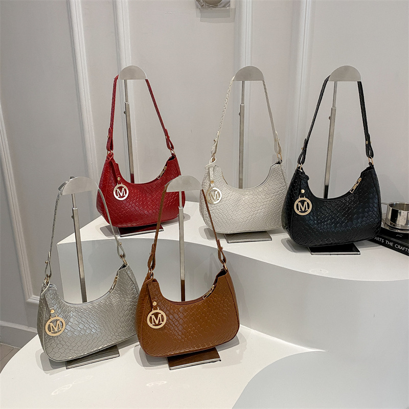 Bolsos populares de este año, bolsos de mujer, 2025, nueva primavera y verano, estilo occidental, media luna, bolsos de axilas, bolsos de hombro de todos los partidos de moda
