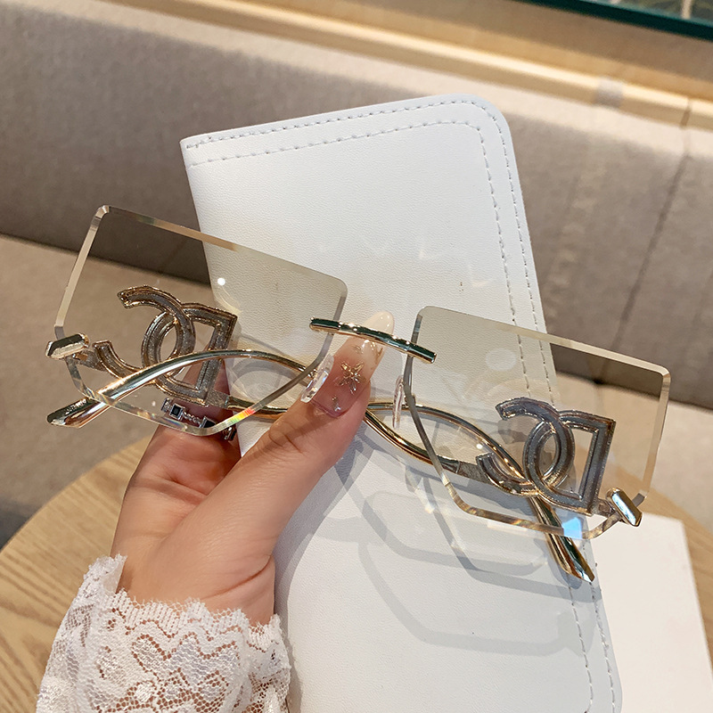 女性用のハイエンドのフレームレスエッジカットサングラス、新しいスタイルのクロスボーダービッグブランド、ハイエンドのメタルサングラス、ファッション用のサンシェード|undefined