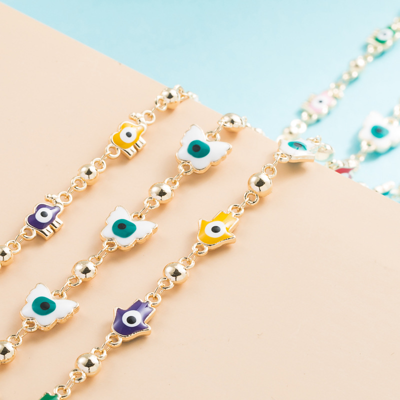 fashion copper inlaid color dripping oil butterfly elephant palm eye pendant long necklace