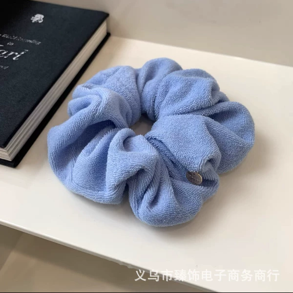 Sky blue plush copper label