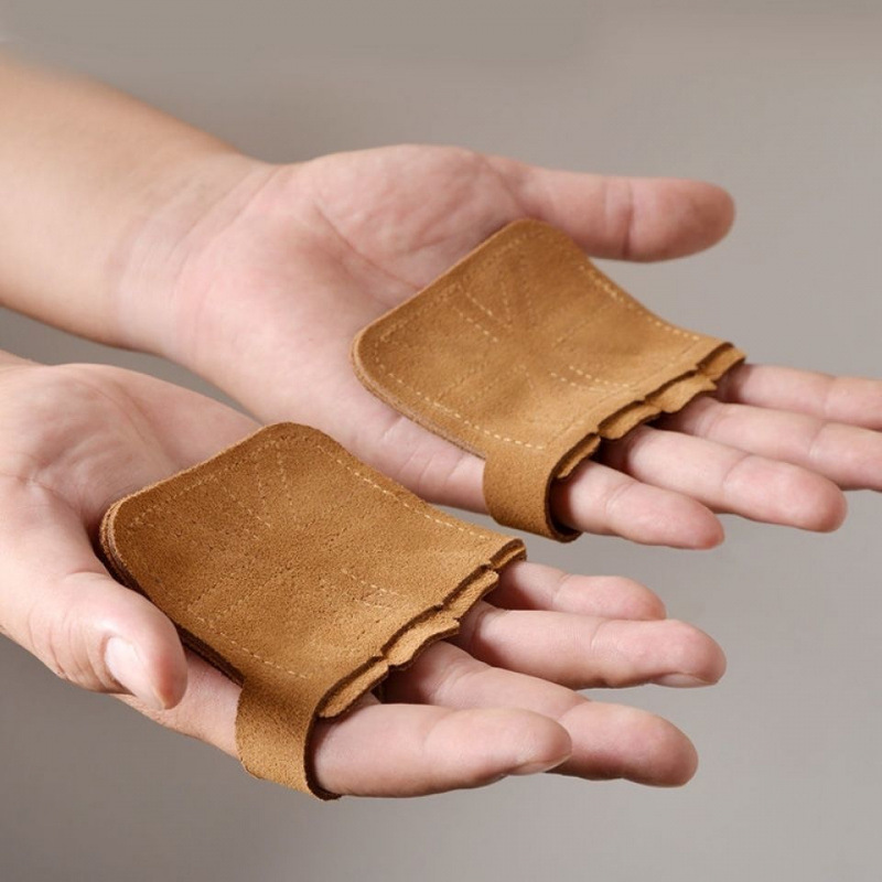 Asistencia de tracción dura con protector de palma de piel de vaca hombre pull-up muñeca barra horizontal pull-back agarre con protector de mano guante de mujer comercio exterior