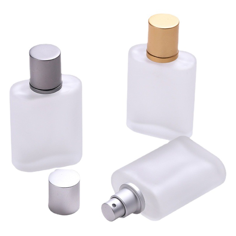 50ml perfume esmerilado botella de spray de vidrio 50CC prensa sub-botella 50ml viaje portátil niebla fina botella vacía