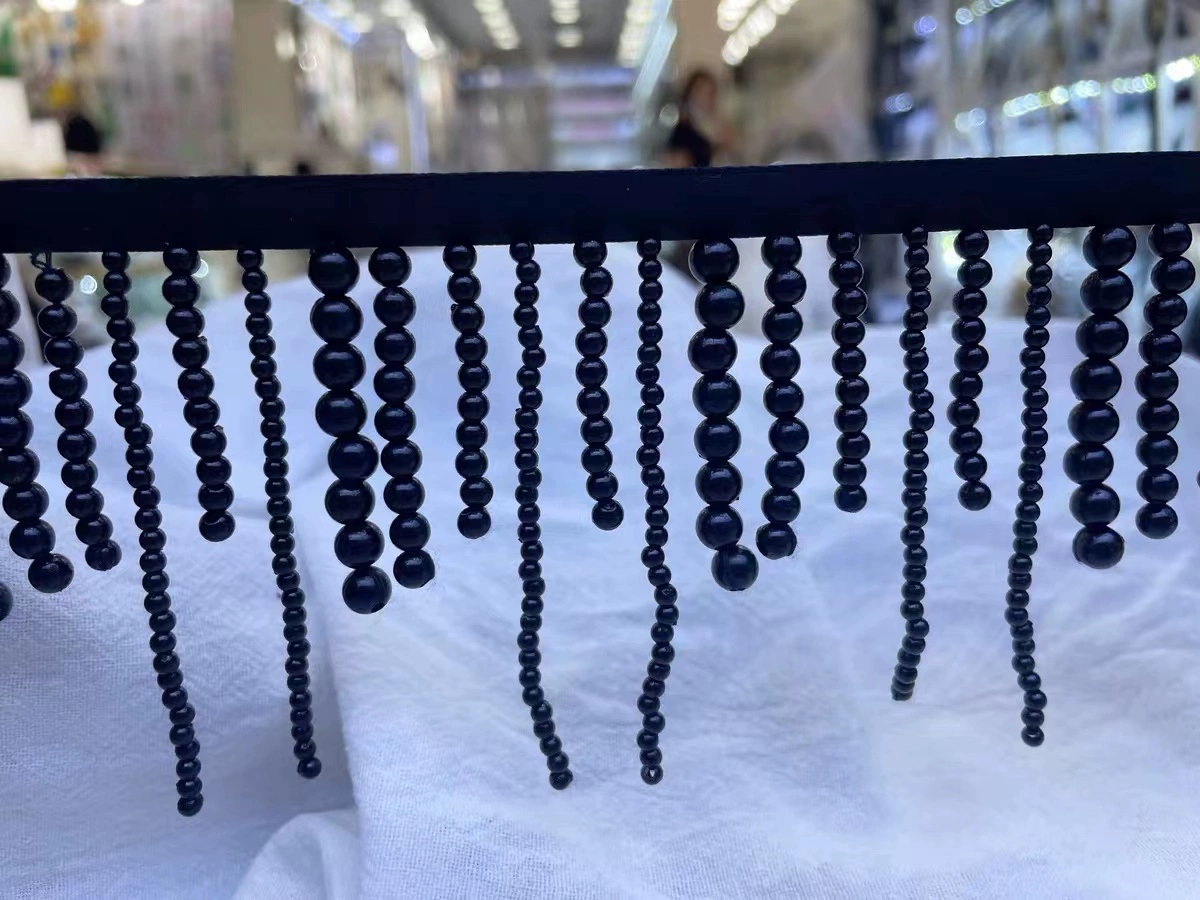 Beads with tassels handmade from pearl, cloth