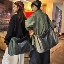 新款日系旅游行李包男大容量出行运动健身包女时尚轻便手提旅行包