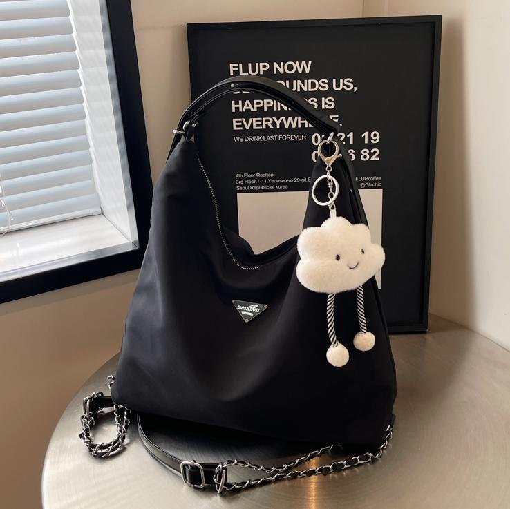 Transfronterizo superfire nylon gran capacidad tote bag2025 nuevo ocio versátil mochila simple mochila mujer
