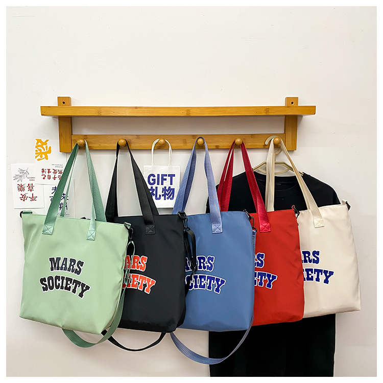 Canvas bag for women, single shoulder, ins crossbody, laid-back style, college student class bag, artistic Japanese style, large capacity, Hong Kong style, chic undefined