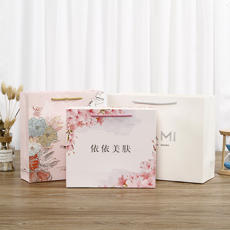 白卡纸购物礼品袋定制时尚印花手提纸袋服装店购物袋定做印刷logo