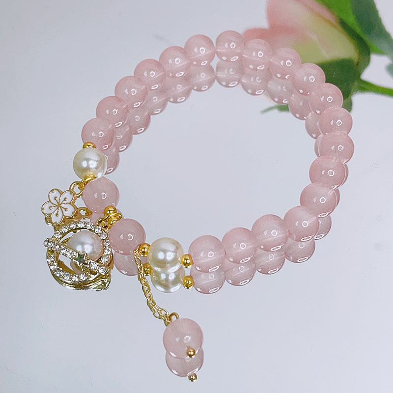 thumbnail image 1 of Pulsera de cristal para estudiantes de primavera y verano, joyería de cuerda de mano con cuentas simple y bonita para mujer, rosa planeta perla, 1 of 2