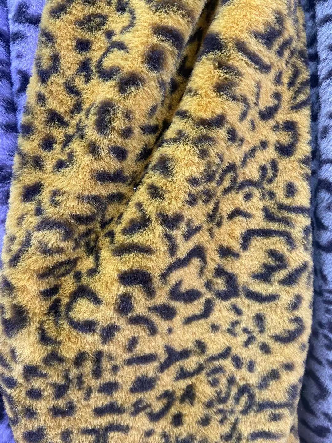 Pequeña piel de conejo impreso anillo de leopardo Imitación Piel de conejo franela ropa abrigo bolsa tela felpa alfombra de juguete tela en stock